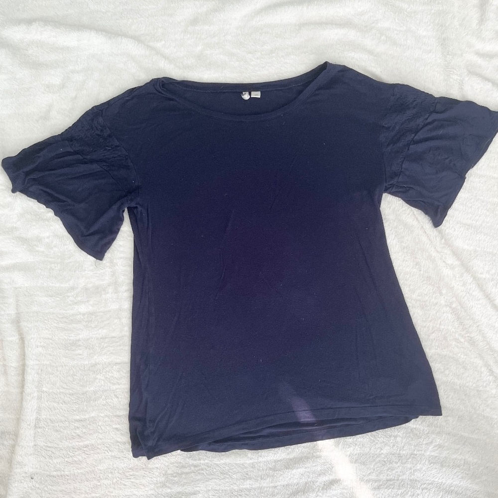 Ty Alexander’s Blue Ruffled Sleeve Shirt